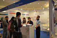 Students and parents gather at the CUSCS booth for programme information